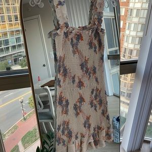 White ruffled mini dress with blue and orange hibiscus flower print. size M